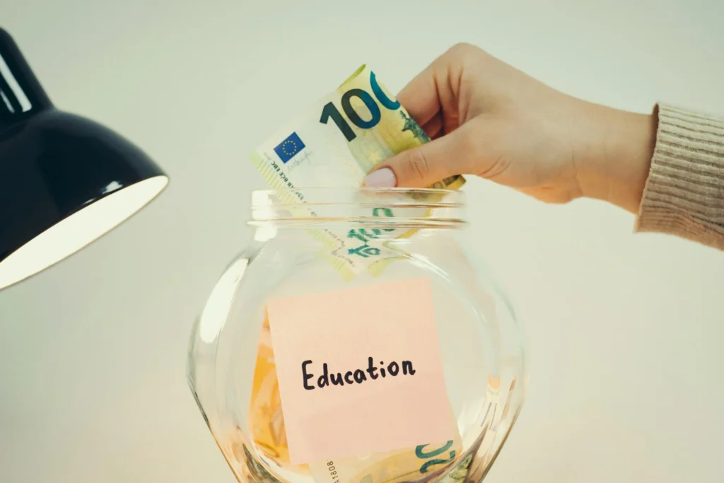 Student loan vs scholarship: borrowed money compared with free aid