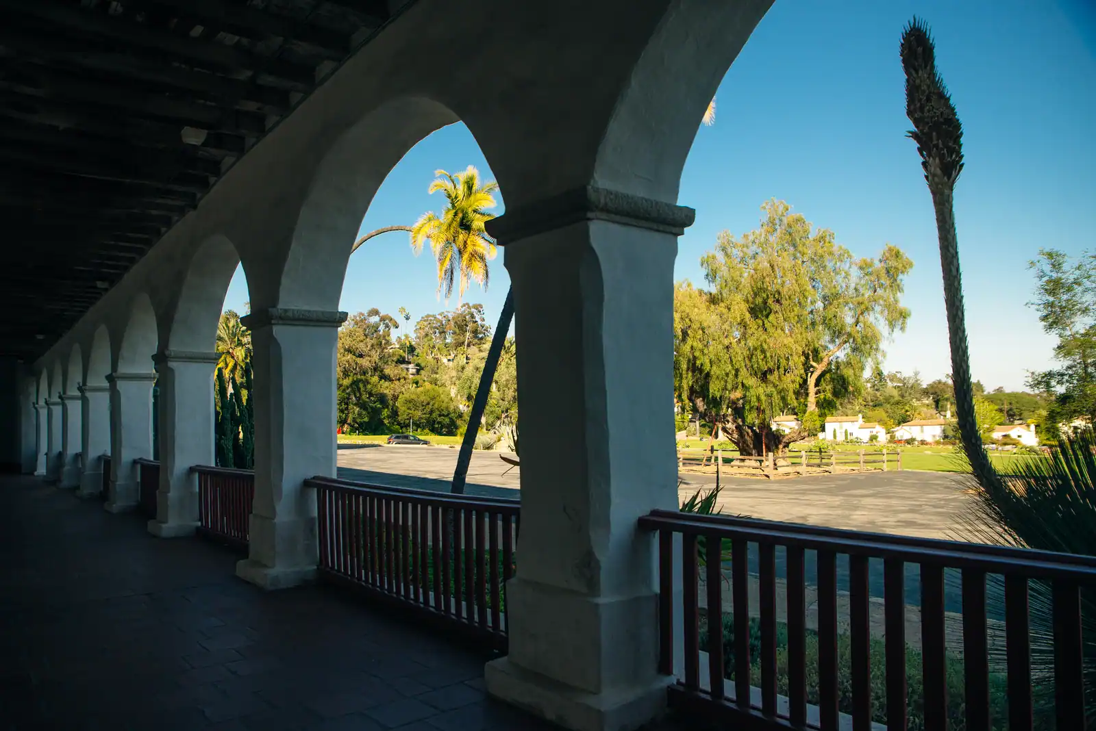 Arched arcade and palm trees at Old Mission Santa Barbara, near Westmont College