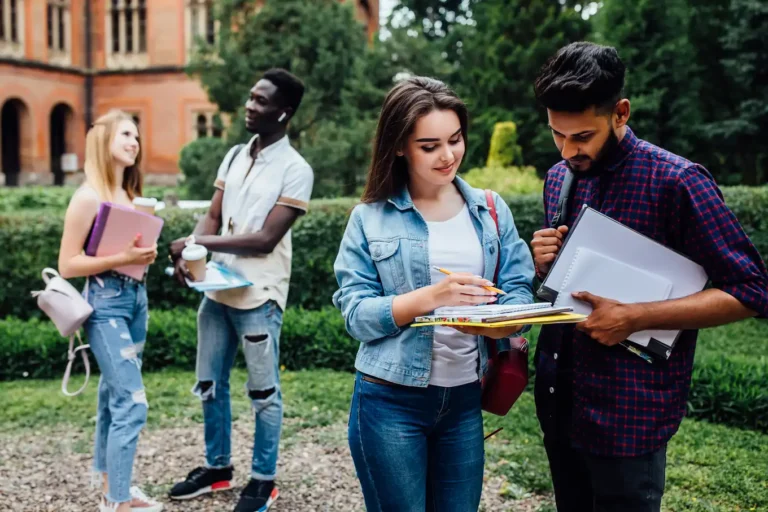 Students talking together in a college courtyard